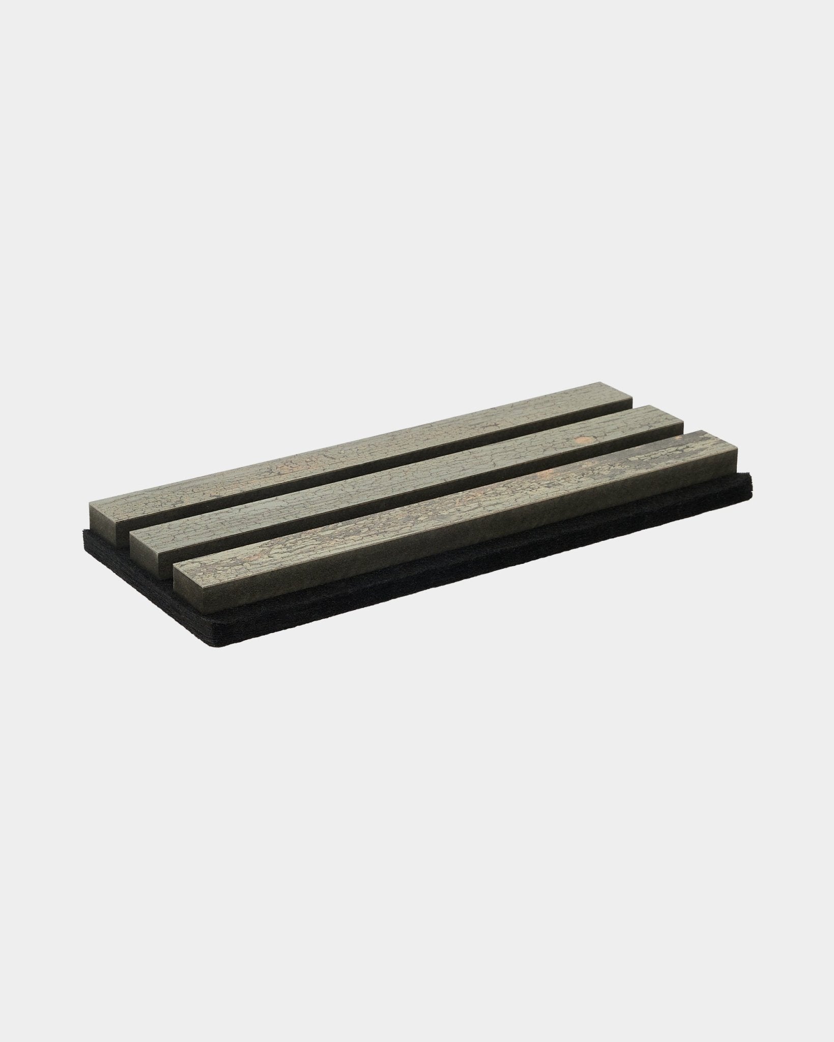 Akupanel acoustic slat panel sample in Grey Oxide, four wooden slats on black acoustic backing, plain white background.