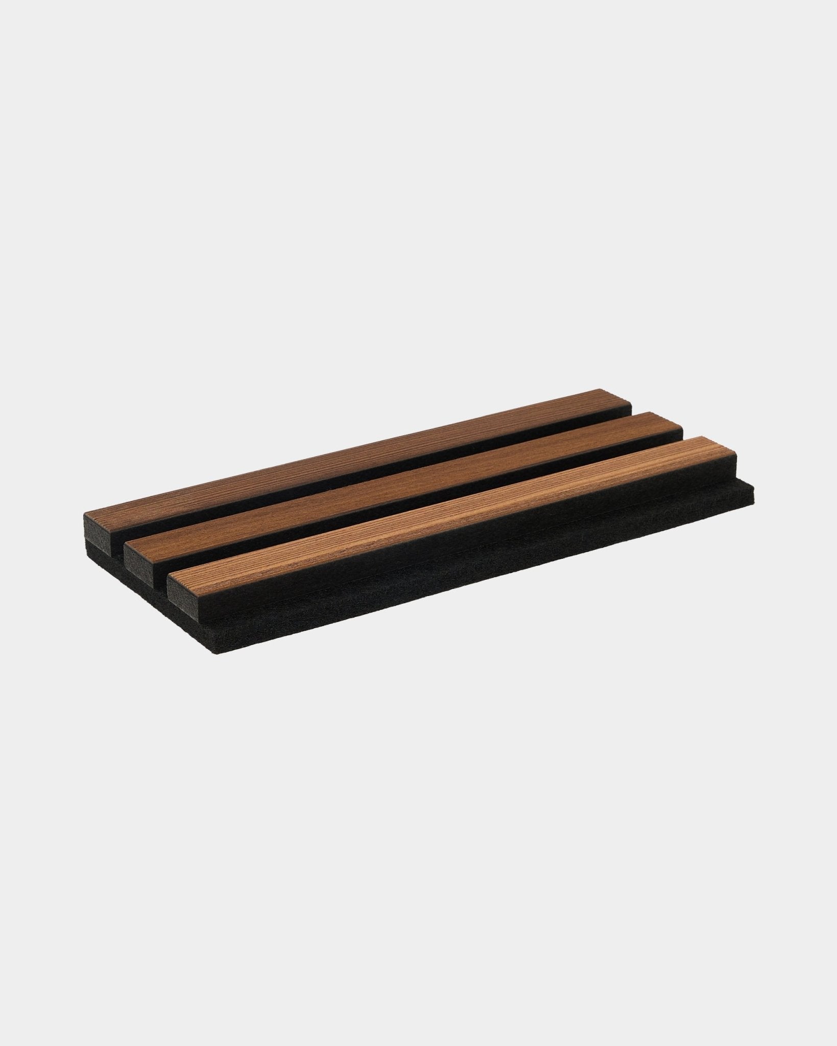 Akupanel Rustic Smoked Larch acoustic slat panel sample on plain grey background.