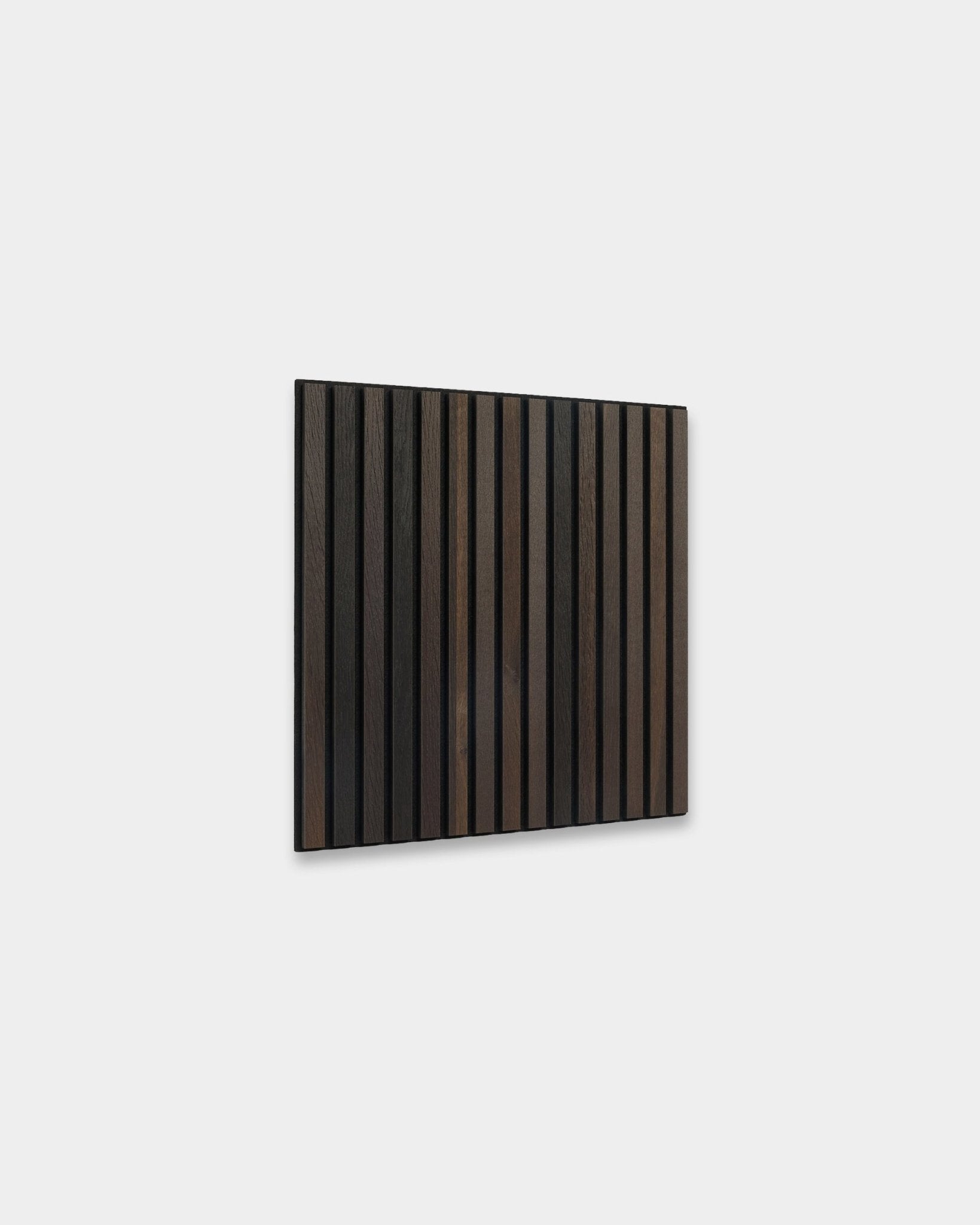 Akupanel acoustic slat wall panel in Smoked Oak on a plain light grey background.
