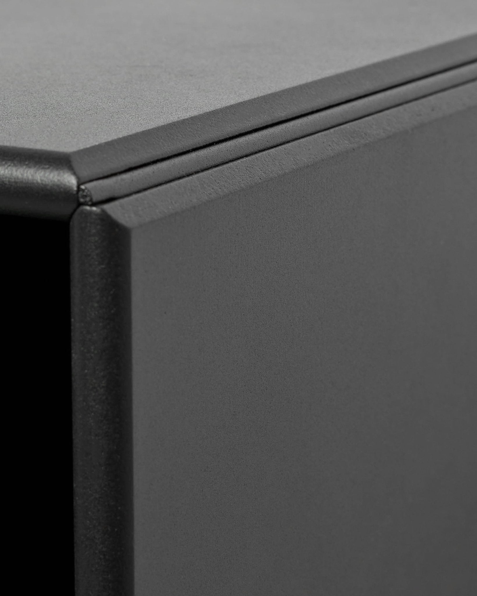 Close-up of WoodUpp Arka Open Cabinet in black, showing defined corner seam; designed as a modular storage unit to complement Nordic acoustic panel collections.