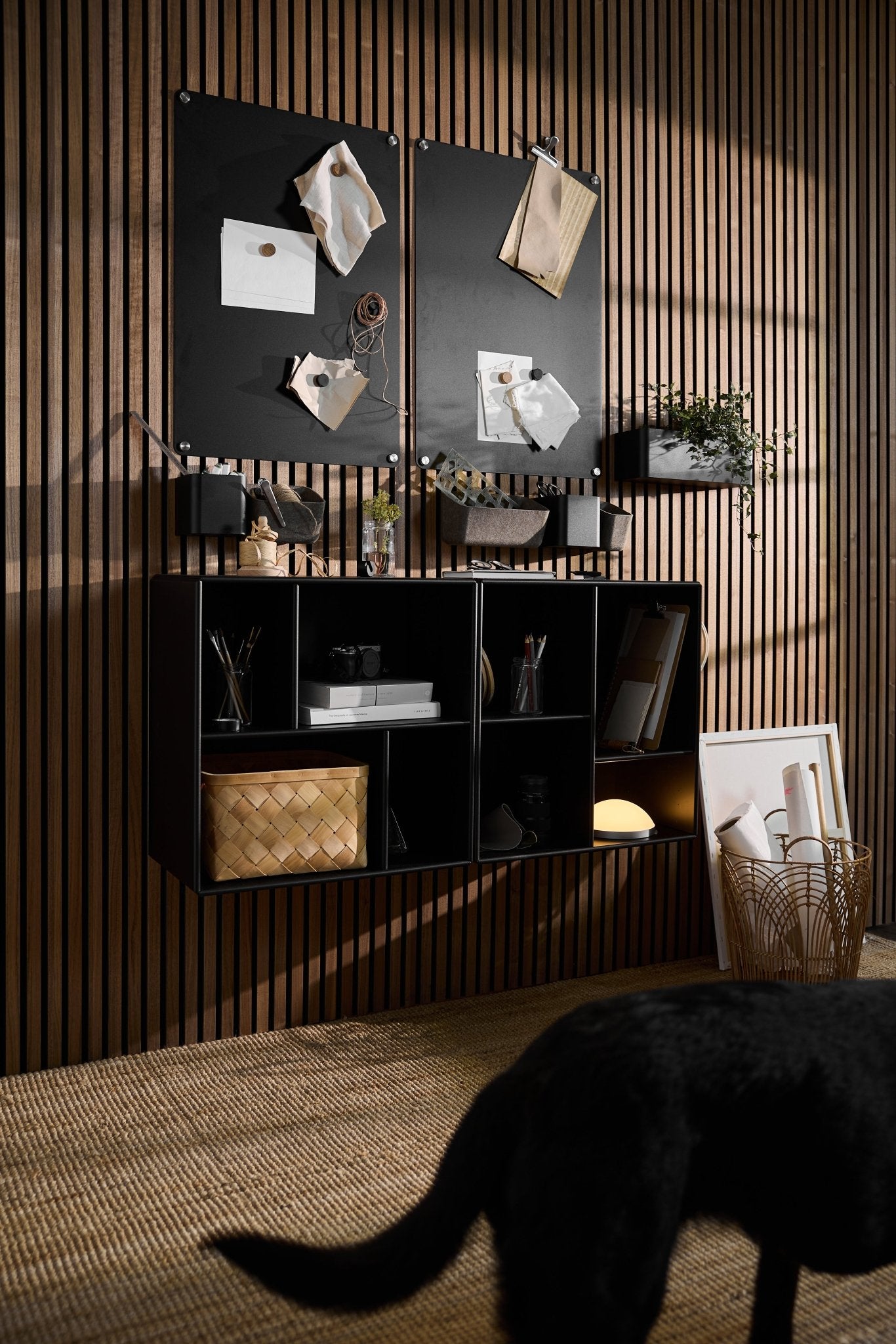 The Arka Open Cabinet by WoodUpp in black offers modular storage with Danish design, complementing Nordic interiors and acoustic wood panels.