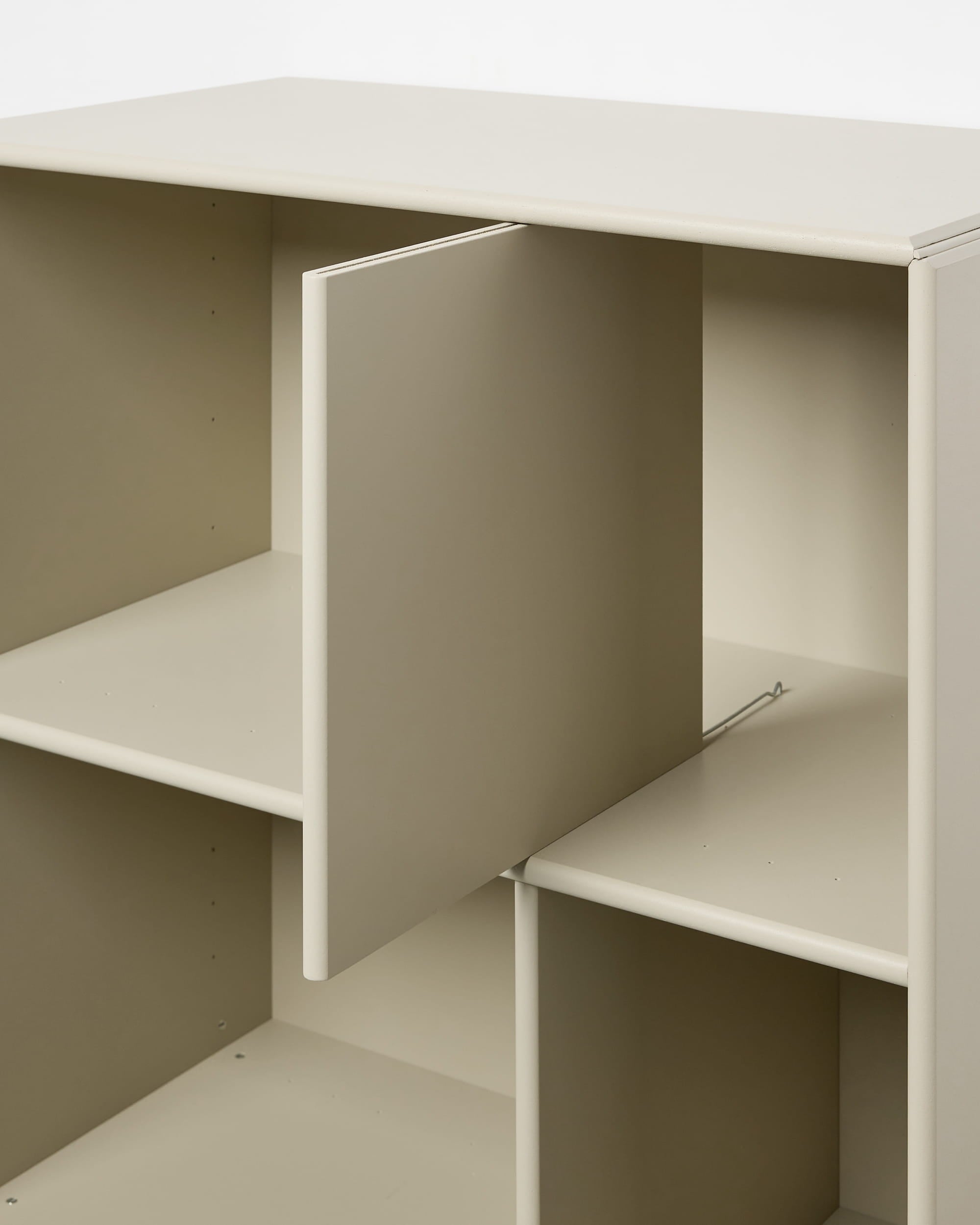 WoodUpp Arka beige open cabinet with modular cubes, open shelves, and a central panel designed for flexible, minimalist organization.