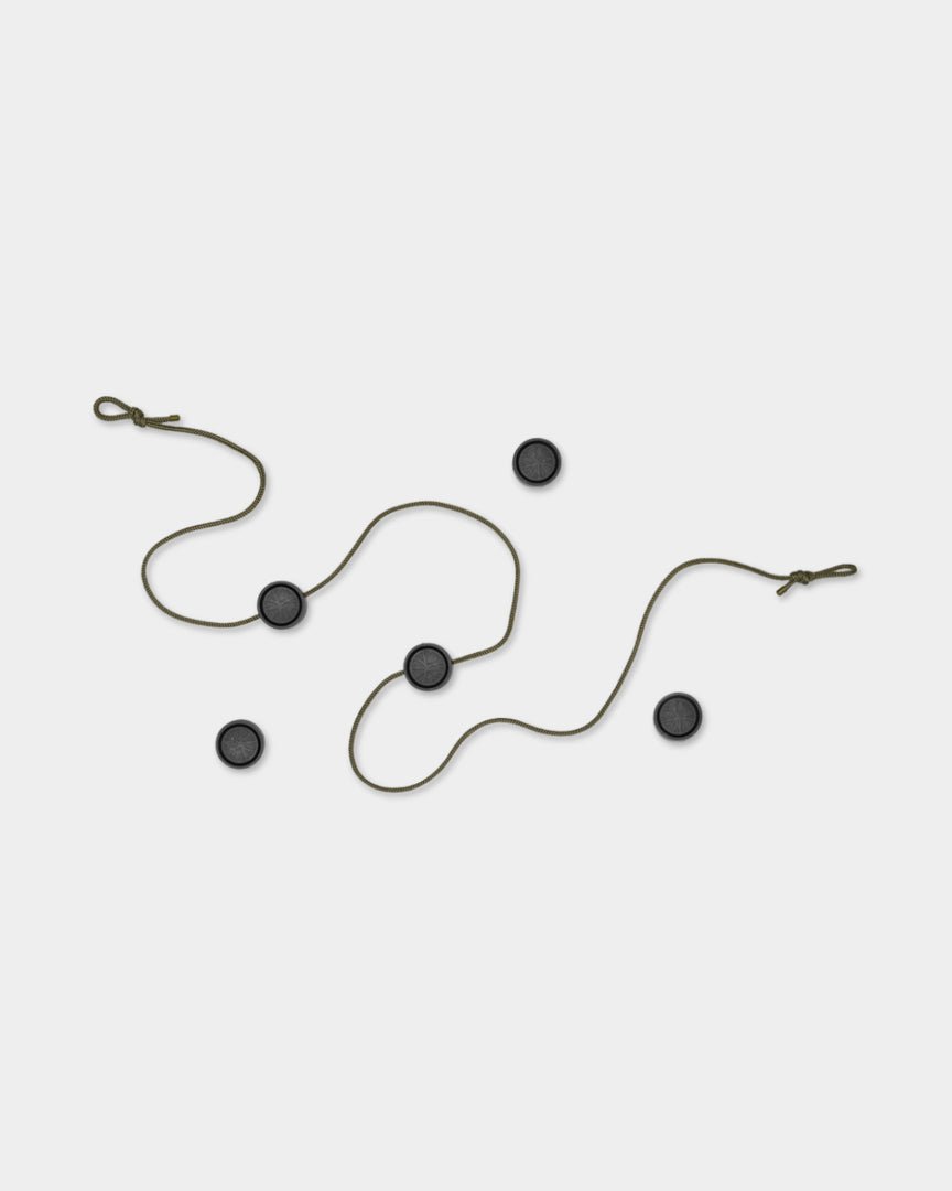 Gallery string with cord and five round black magnetic clips on a light gray background.