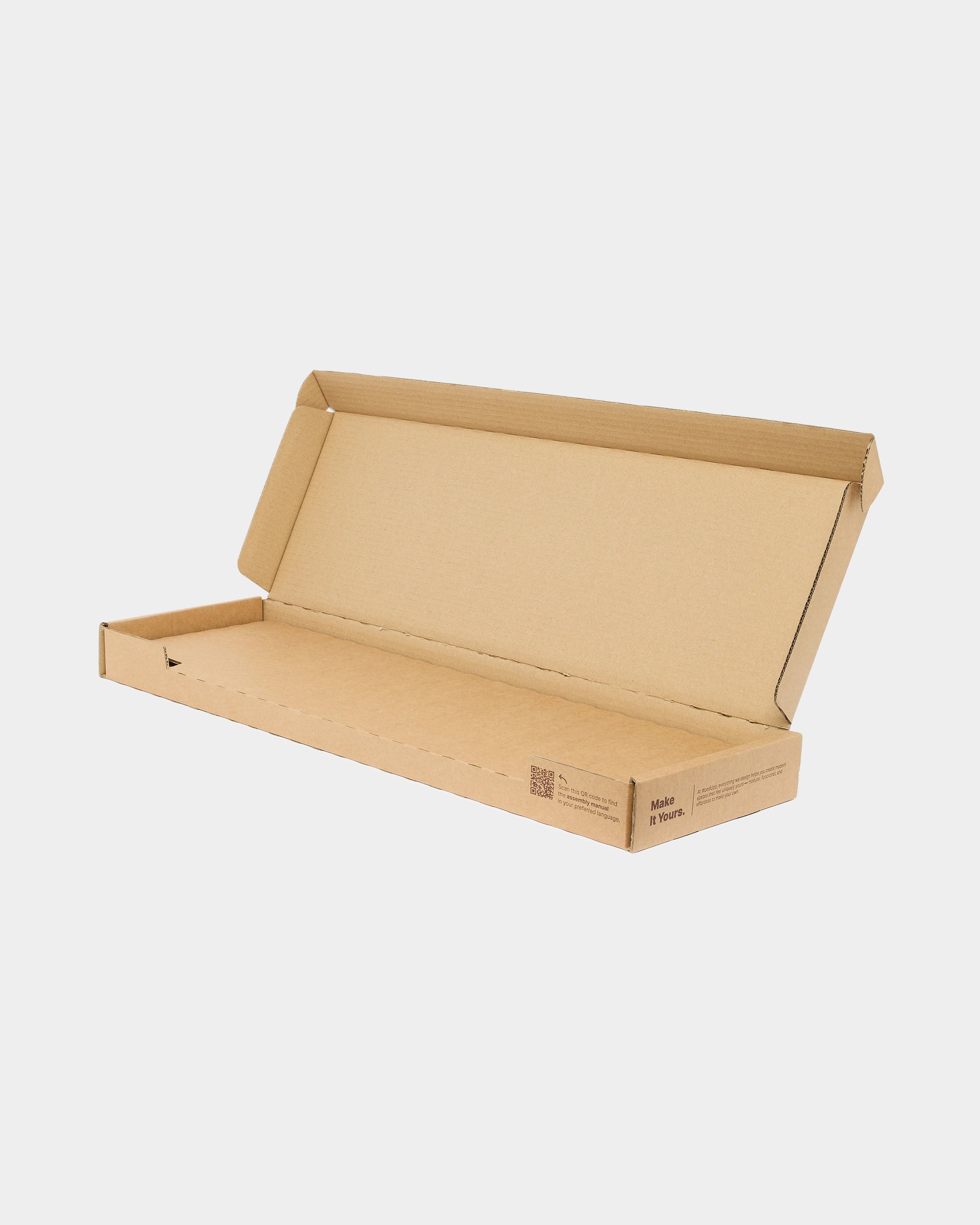 Open rectangular brown cardboard shipping box with a hinged lid, placed on a plain white background.
