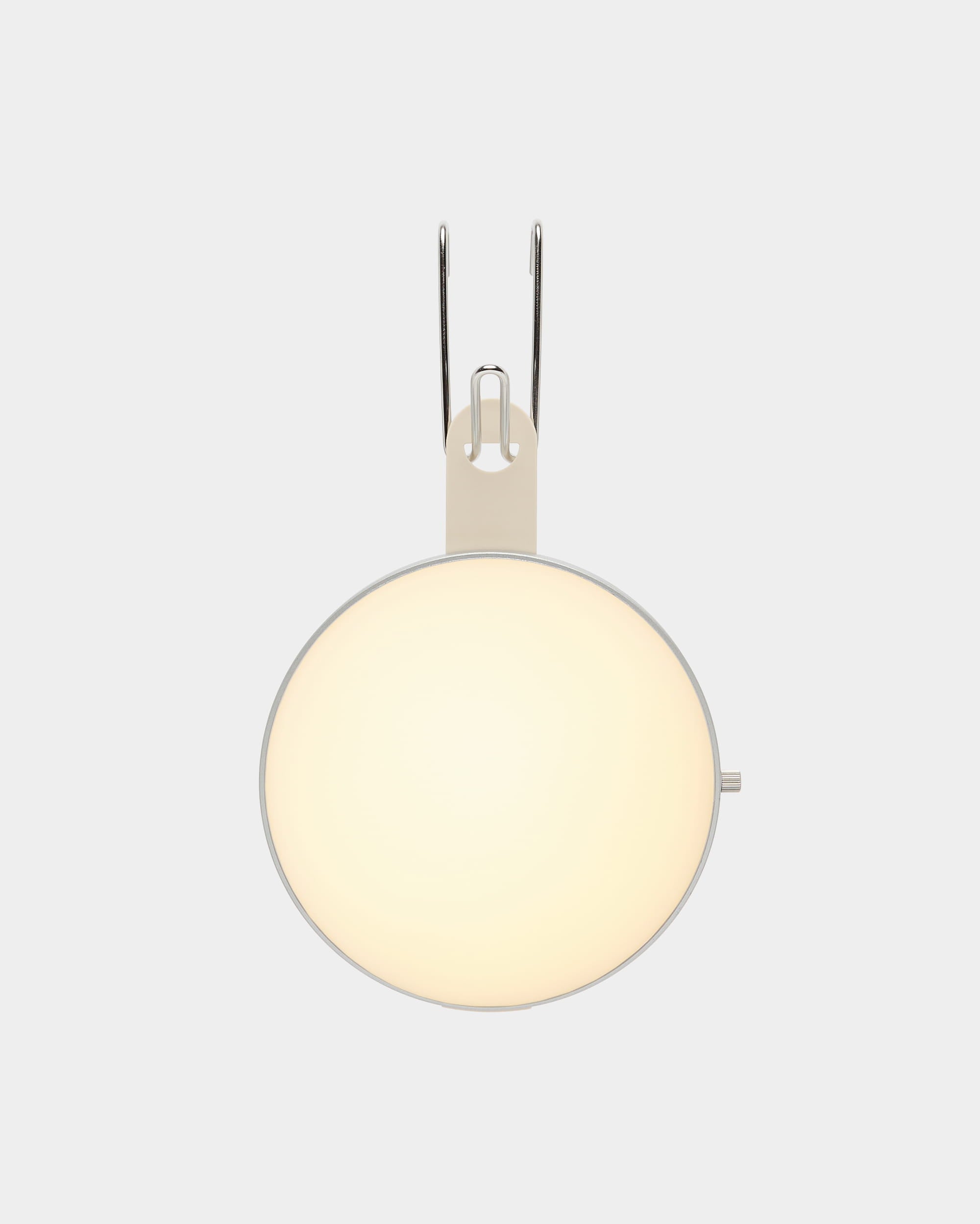 WoodUpp Vala portable LED lamp with frosted glass shade and metal bracket, mounted on a light gray wall, highlighting Nordic minimalist design.