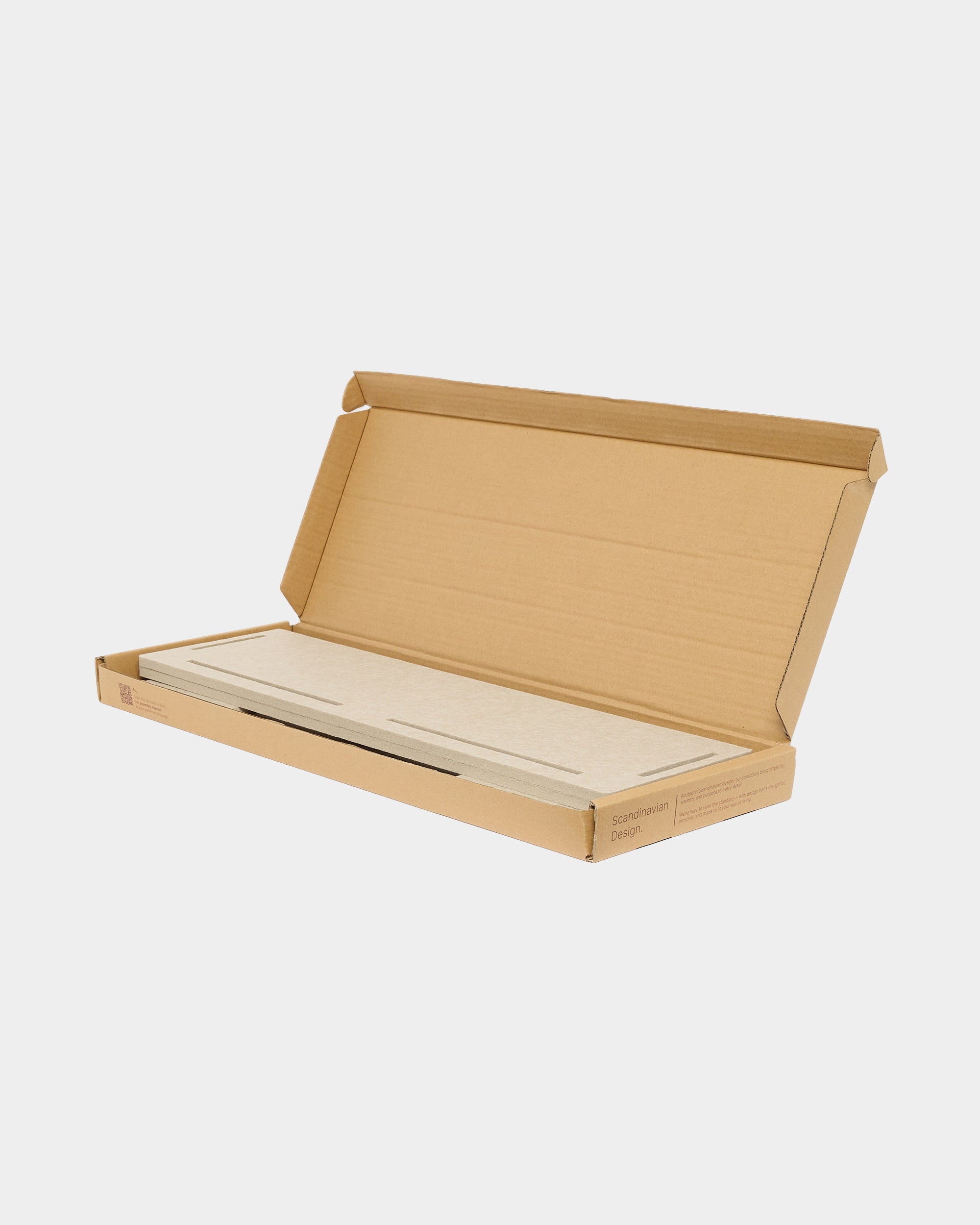 Open corrugated cardboard box with flat beige panels inside on a plain white background.