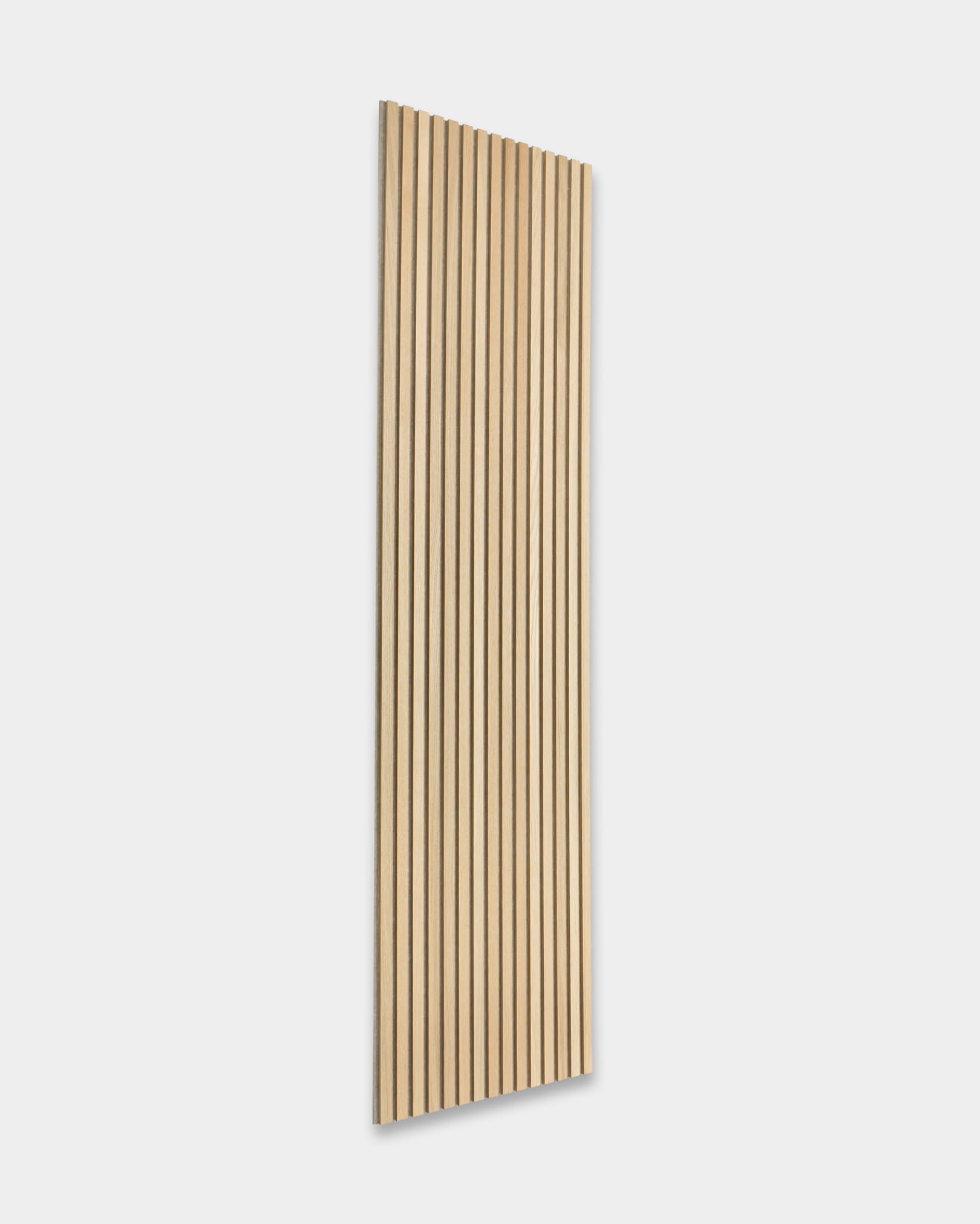 A rectangular Akupanel acoustic wood panel with vertical slats, shown against a plain light gray background, emphasizing its minimalist Nordic design.