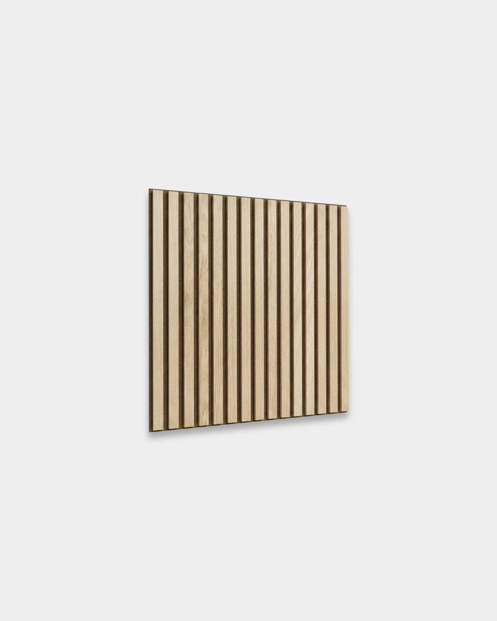 WoodUpp Akupixel acoustic panel in Carolina Oak with dark beige felt backing, 60x60 cm. Scandinavian, Nordic design for white wall sound absorption.