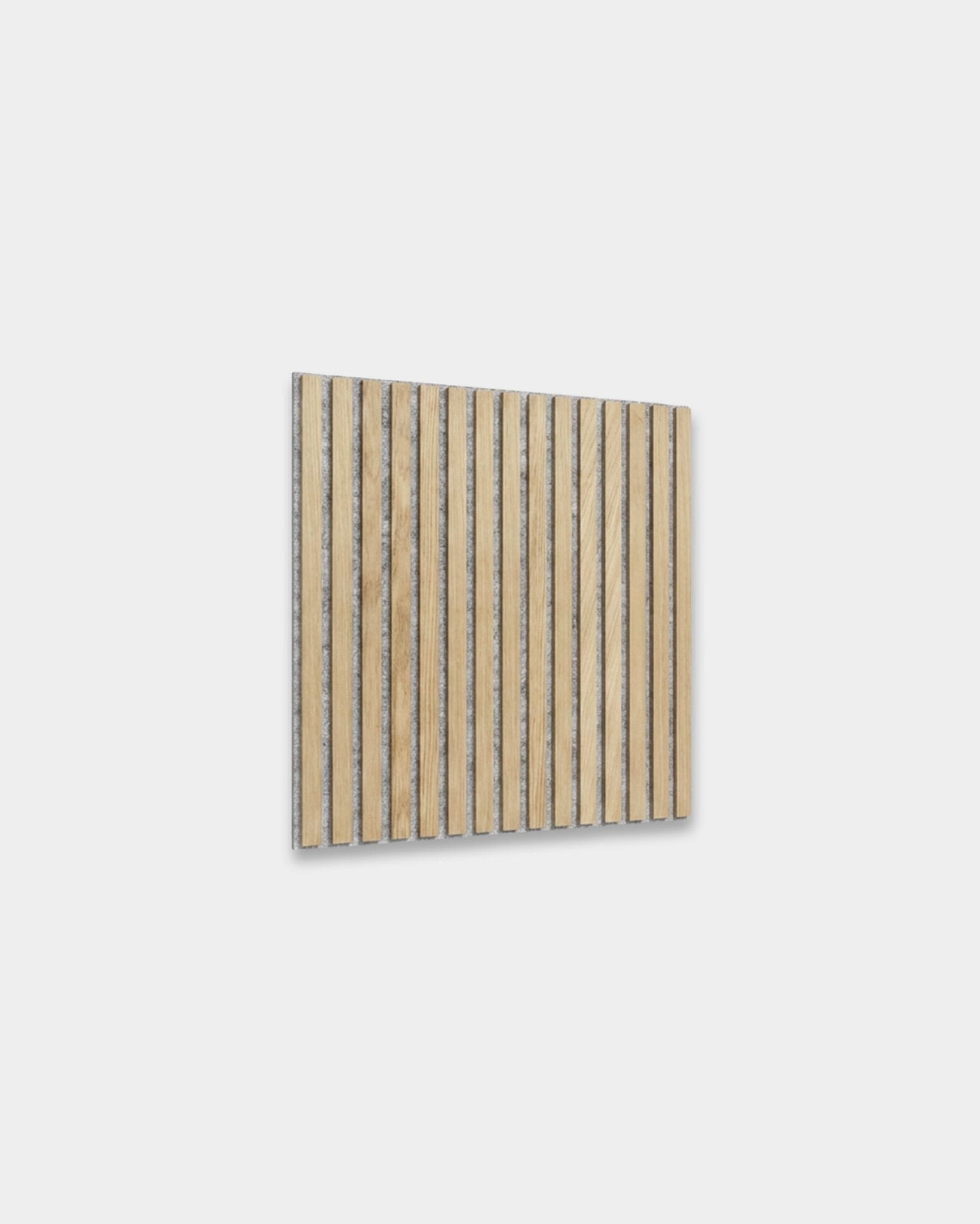 Akupixel acoustic panel by WoodUpp, 60x60cm with classic oak slats, grey felt backing, Scandinavian style, natural wood finish and dark gaps between slats.
