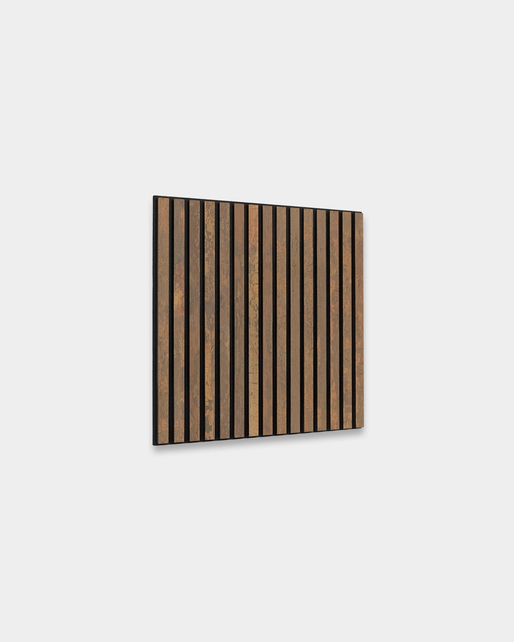 WoodUpp Akupixel acoustic panel in Oxide Copper with black felt, 60x60 cm, mounted against a white background to enhance acoustics and add color contrast.