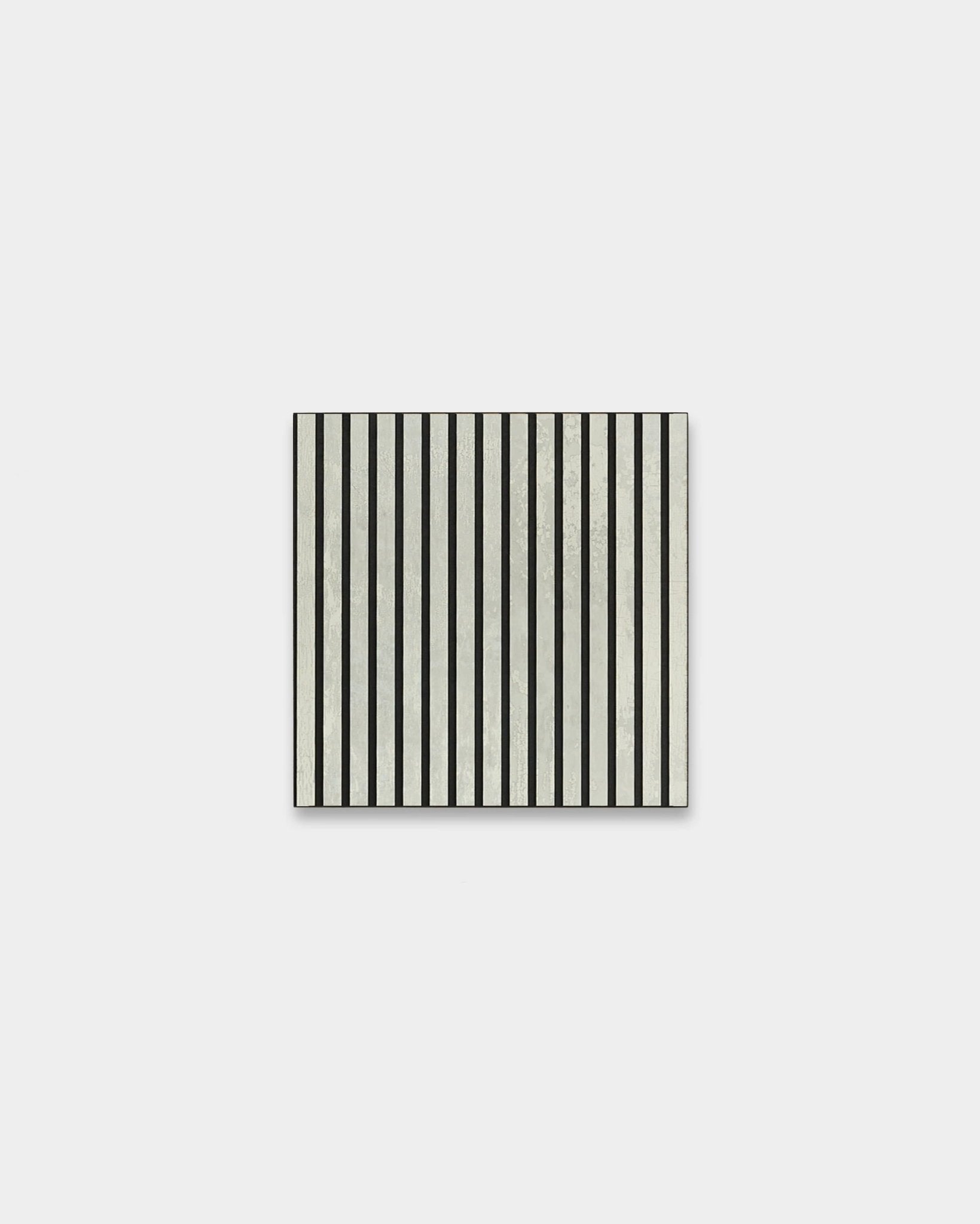 Akupixel acoustic panel by WoodUpp in Nordic style, with evenly spaced vertical black felt and oxide white stripes on a light gray base, 60 x 60 cm.