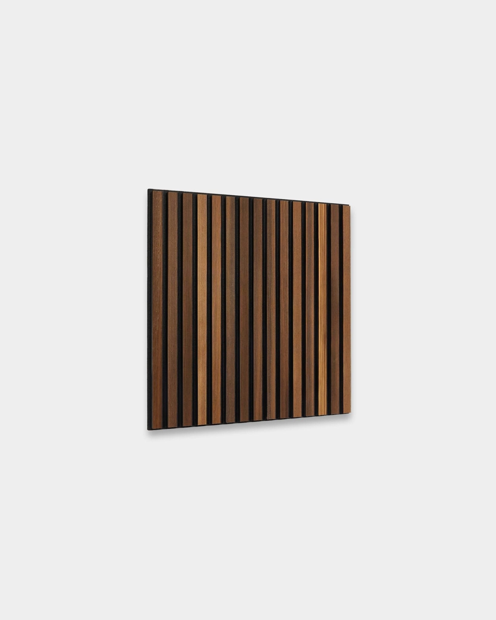 Akupanel acoustic slat wall panel with smoked larch wood slats on black felt backing, shown on plain light grey background.